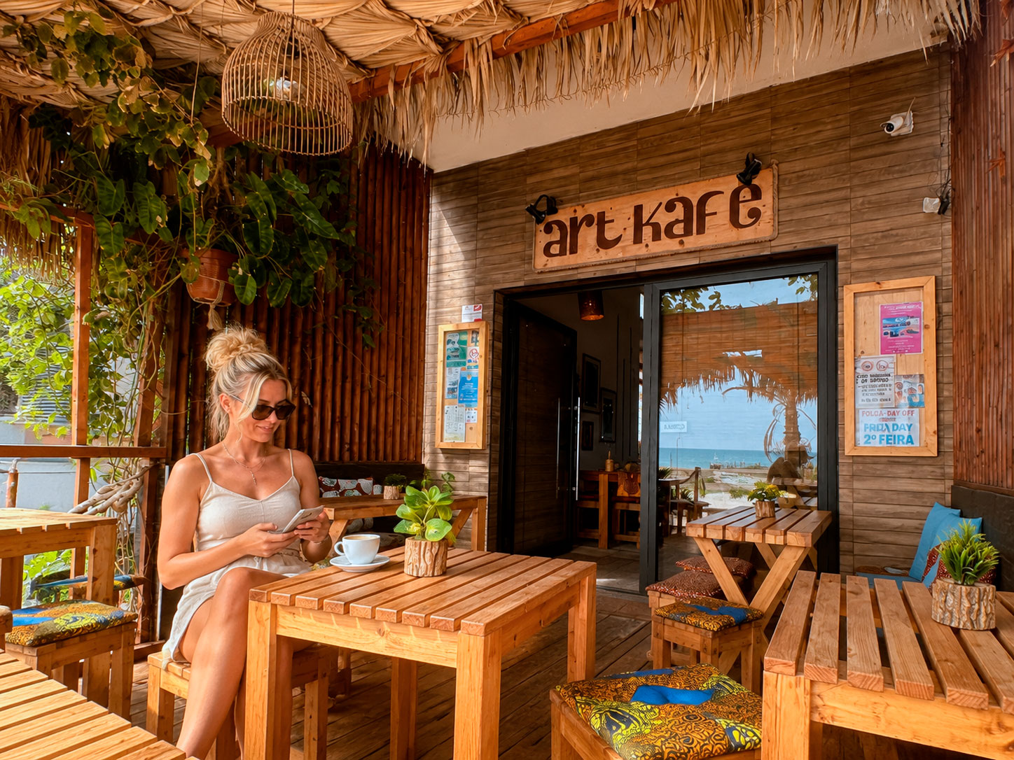 How Many Days in Sal Island – Relaxing at Art Kafé in Santa Maria Nordic woman having coffee at Art Kafé in Santa Maria, Sal Island, Cape Verde