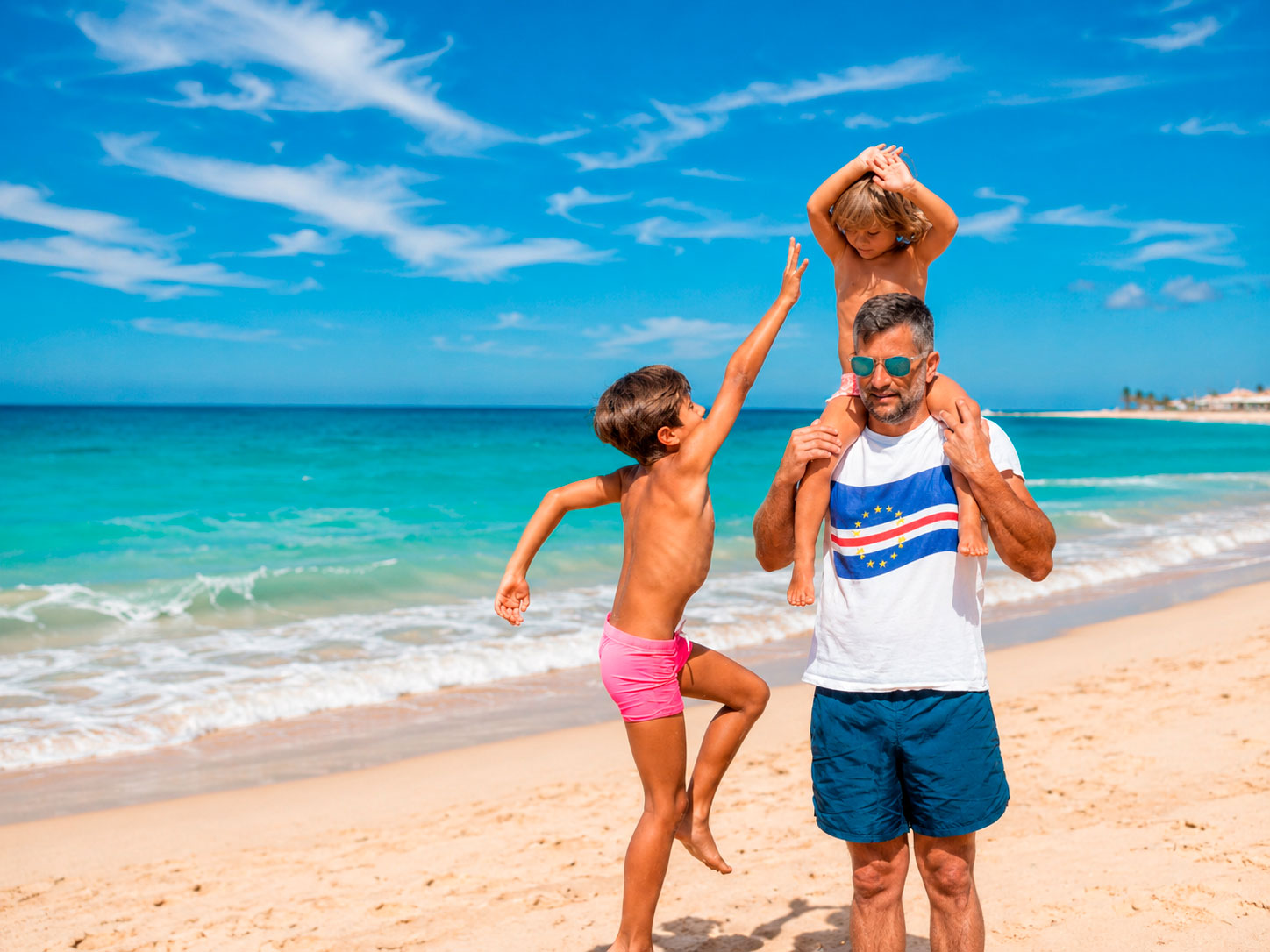 Sal Island with Children – Family Travel in Cape Verde Father with two children enjoying a sunny beach in Santa Maria, Sal Island